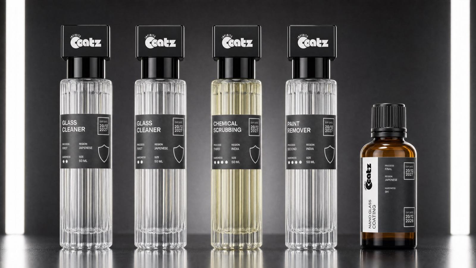 The five Infinite Coatz bottles in a row: two Glass Cleaner, Chemical Scrubbing, Paint Remover, and the amber Nano Glass Coating.